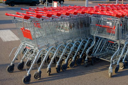 Photo for Iron carts in a row near the supermarket Rewe - Royalty Free Image