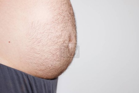 Photo for Big stomach on a fat man isolated - Royalty Free Image