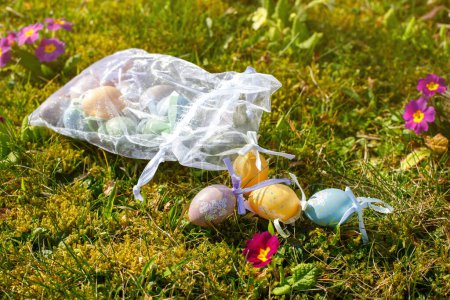 bag of easter eggs on the grass