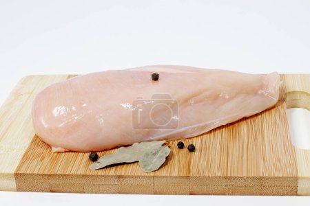 fresh raw chicken fillet meat with spices ready for cooking