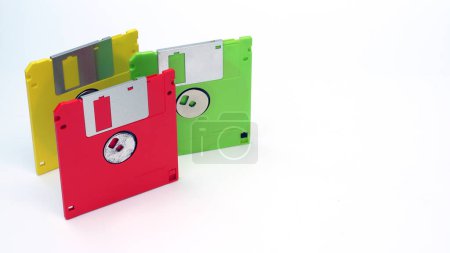 Photo for Floppy disks on a white background.Multi-color floppy disks. - Royalty Free Image