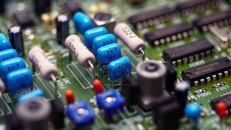 Photo for Electronics on board electrical circuits on closeup shot. Selective focus. - Royalty Free Image