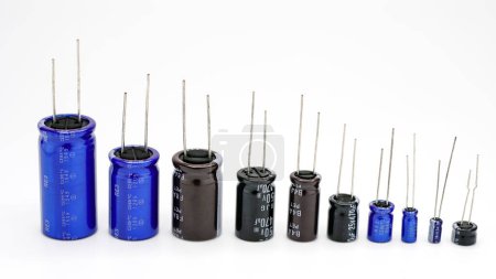 Photo for Group of capacitors different sizes isolated on white background. Electronic parts concept. - Royalty Free Image