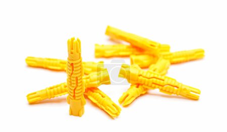 Photo for Plastic dowels on white background, wall plug - also known as screw anchor, construction tools. - Royalty Free Image
