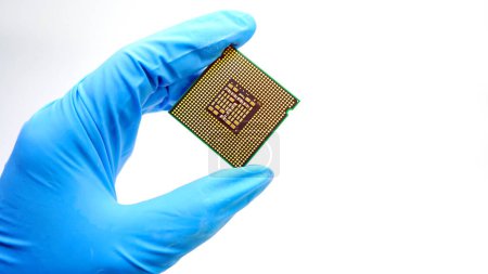 Photo for Engineer hand holding cpu chipset - Royalty Free Image