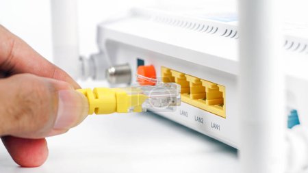 Photo for Network router and cables with plug. - Royalty Free Image