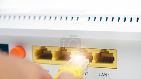 Photo for Network router and cables with plug. - Royalty Free Image