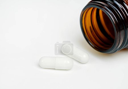 Photo for Pills and bottle on a white background - Royalty Free Image