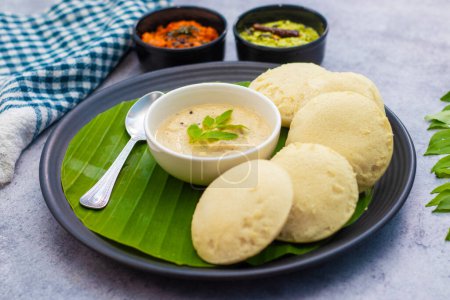 selective focus of South Indian famous food "Idli vada" with Sambar and Chatney.