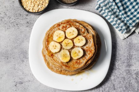 super healthy food "Oatmeal pancakes" with honey and chia seeds.