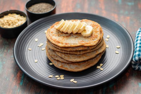 super healthy food "Oatmeal pancakes" with honey and chia seeds.