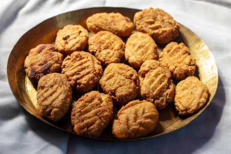 Thekua is an Indian sweet dish.popular in uttarpradesh, bihar and jharkhand.offering for the chhat festival.
