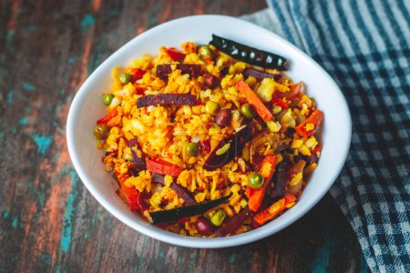 "Poha "Leckeres indisches Essen aus abgeflachtem Reis.
