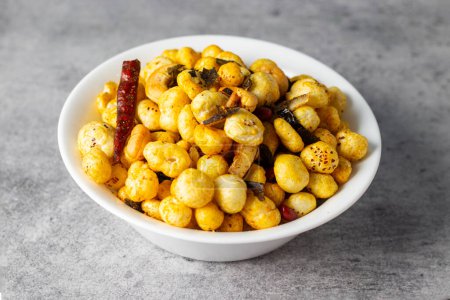 Photo for Selective focus of delicious Makhana chaat, made of roasted lotus seeds. - Royalty Free Image