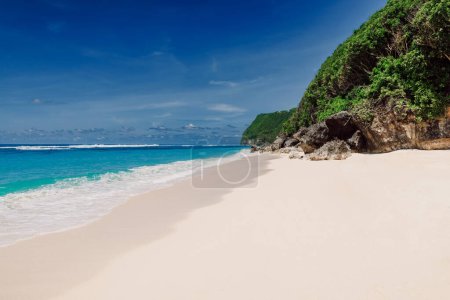 Photo for Tropical beach in Bali with turquoise ocean. Holidays in paradise island - Royalty Free Image