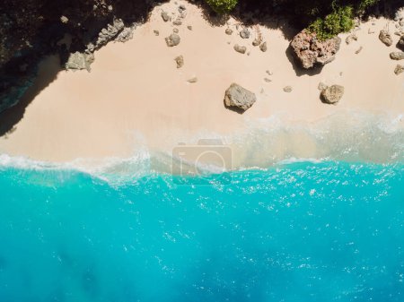 Photo for Aerial view of sandy beach with stones and turquoise ocean in Hawaii - Royalty Free Image