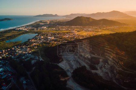 Photo for Campeche area in Florianopolis with quarry, ocean and sunset lights - Royalty Free Image