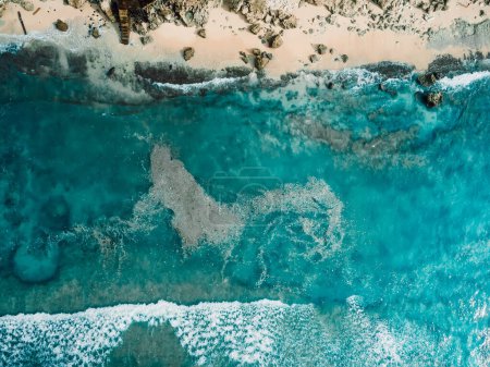 Photo for Beach in Bali and plastic trash in ocean. Dirty plastic bottles and bags on a garbage. Ocean pollution, plastic in water. Aerial view. - Royalty Free Image