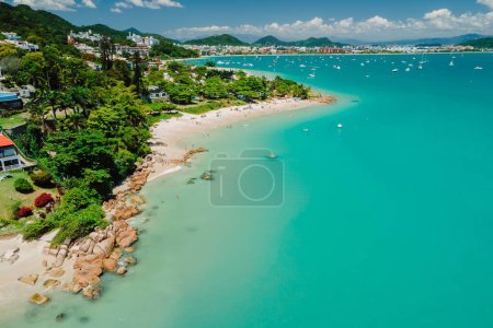 Photo for Tropical holiday beach with turquoise quiet ocean in Florianopolis. Aerial view - Royalty Free Image