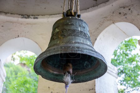 Foto de Copper bell hanging in the bell tower of Sapara Monastery, Georgia. - Imagen libre de derechos