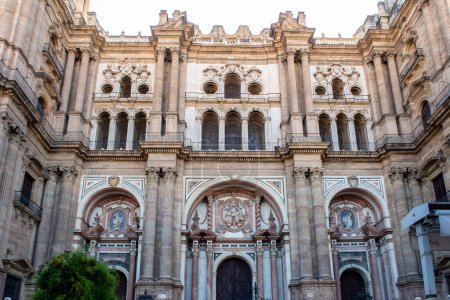 Photo for The Cathedral of Malaga front symmetrical view. Medieval Roman Catholic church in renaissance style with baroque facade with arches and portals. Malaga, Andalusia, Spain. - Royalty Free Image