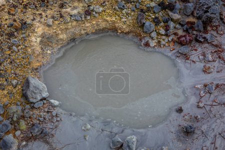 Bubbling mud pot at Seltun Geothermal Area in Krysuvik, close-up view, Iceland.