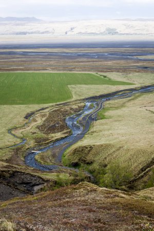 Raw volcanic landscape of the Thorsmork valley in South Iceland with Markarfljt winding river.