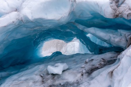 Blue ice cave in Skaftafell Glacier, part of Vatnajokull National Park, Iceland.