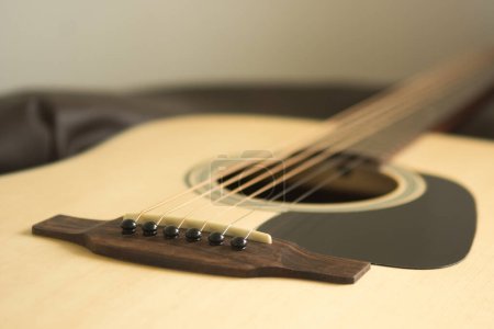 Photo for Close up of acoustic guitar with very shallow depth of field.(warm tone) - Royalty Free Image