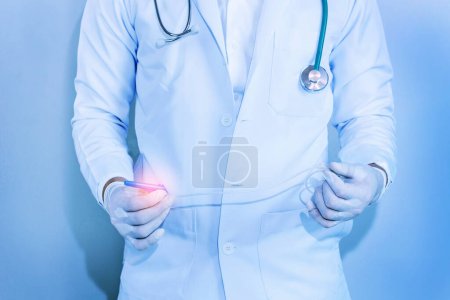 Photo for Hands and remedial catheter. Hygienic care of the patient.(Blue tone - Royalty Free Image