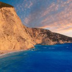 The beautiful beach of Port Katsiki during summer time with turquoise shining ocean on the island of Lefkada, Ionian Sea, Greece