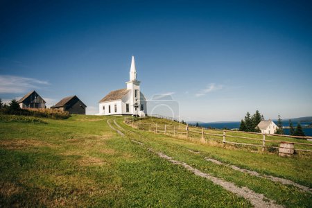 Photo for Historic church at Highland Village Museum Iona Cape Breton with Great Bras dOr Lake. High quality photo - Royalty Free Image