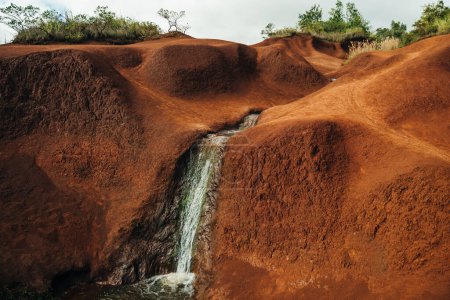 The famous Red Dirt Falls, a cascading waterfall in Waimea Canyon State Park. kauai, hawaii. High quality photo
