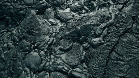 Textura de la superficie de la roca de lava basáltica de un flujo en el Parque Nacional Volcanes de Hawaii, Isla Grande de Hawaii, EE.UU..