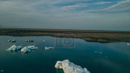 Aerial drone panorama of famous lake Joekulsarlon glacial lagoon and diamond beach with its icebergs. High quality photo