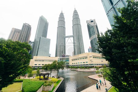 Photo for Kuala Lumpur, Malaysia - summer 2022 : Petronas Twin Towers with bridge. High quality photo - Royalty Free Image