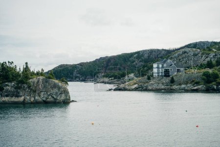 Brigus, Newfoundland, Canada: Small fishing village on a calm, grey day. High quality photo