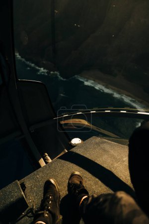 inside the cockpit of a helicopter in hawaii. High quality photo