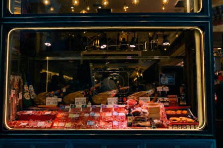 Photo for Valencia, spain - august 12th 2023 display window of a butcher shop in Spain. High quality photo - Royalty Free Image