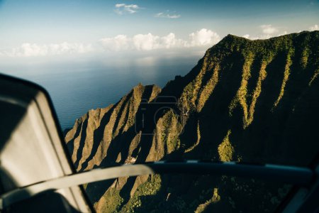 inside the cockpit of a helicopter in hawaii. High quality photo