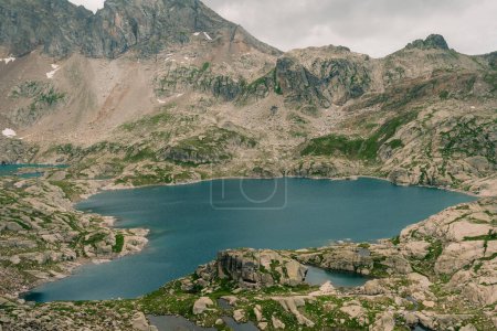 Panoramic view on Lake Artouste, a semi-artificial lake in the Pyrenees mountains, National Park of Pyrenees, France. High quality photo