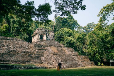 couple in Mayan ruins in Palenque, Chiapas, Mexico. High quality photo