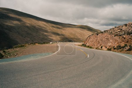Photo for Road leading towards the Salinas Grandes salt flats near Purmamarca. High quality photo - Royalty Free Image