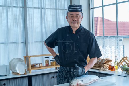 Photo for Closeup of chef hands japanese food, Japanese chef making sushi at restaurant. Happy Japanese chef do thumb up sign gesture. - Royalty Free Image