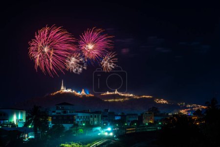 Photo for The annual celebration. Train on railway with fireworks in annual event on Phra Nakhon Khiri, Khao Wang at Phetchaburi, Thailand. - Royalty Free Image