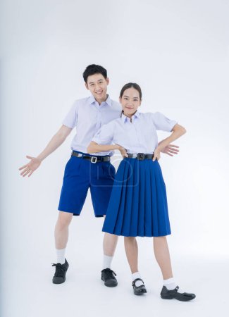 Photo for Thai students. Asian girl and boy in students uniform on white background. - Royalty Free Image