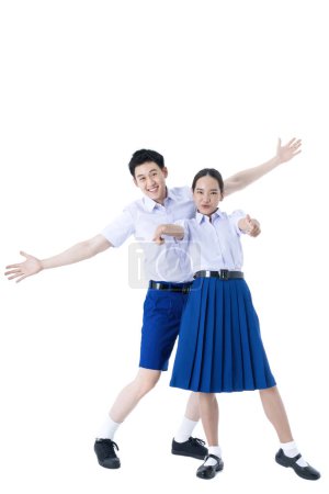 Photo for Thai students. Asian girl and boy standing together friendly in students uniform on white background. - Royalty Free Image