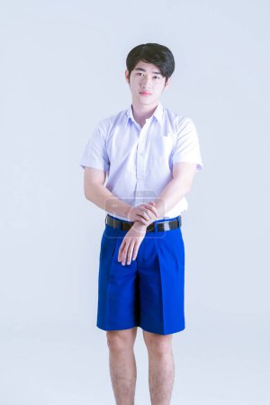 Photo for Back to school. Thai students. A boy with a wrist injury. - Royalty Free Image