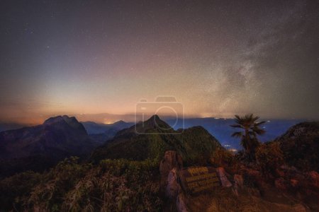 Photo for Milky Way Galaxy at Doi Luang Chiang Dao with Thai Language top point signs. Chiang Dao Wildlife Sanctuary, Chiang Mai - Jan 13, 2024. - Royalty Free Image