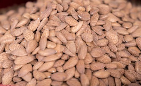 Photo for Almond seeds. Background of dried almond nuts. - Royalty Free Image